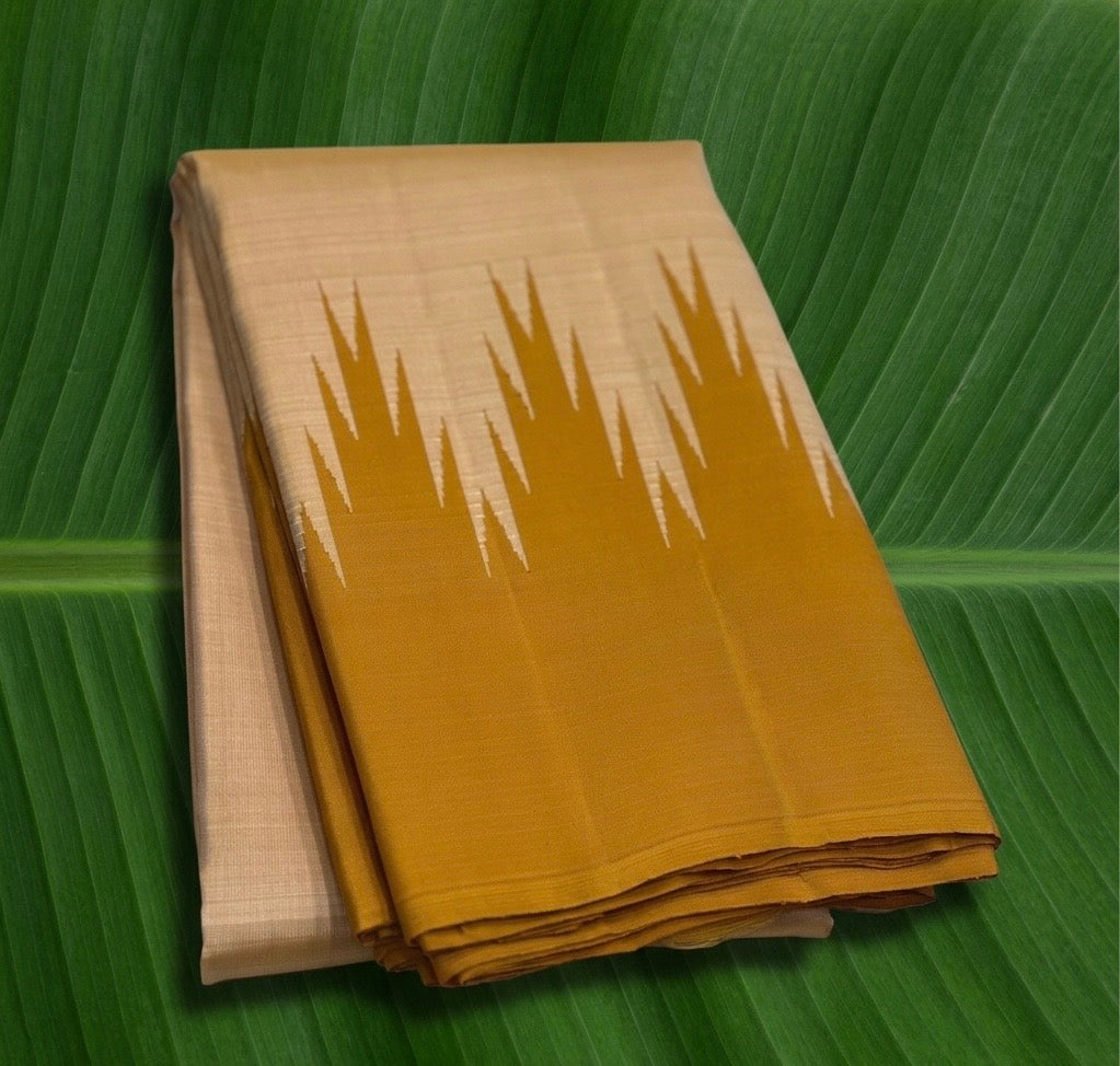 honey gold Kanchipuram silk saree with tr weave folded view