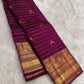 Naval Pazham purple Kanchipuram silk saree with fine gold zari lines in the Vairaoosi weave