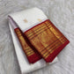 Warm ivory handwoven pure silk Kanchipuram Kai Korvai saree with gold zari flying horse buttas and temple-red border