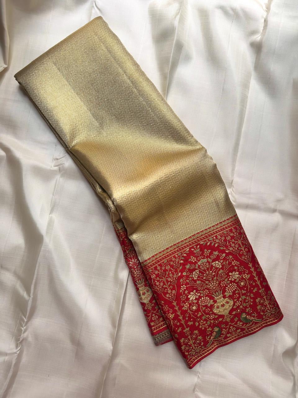 Sandalwood ivory handwoven pure silk Banarasi-Kanchipuram fusion saree with champagne-gold zari and vermilion-red floral urn and bird border