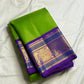 Close-up of the fine Vairaoosi weave texture on the Thulir Pachai green Kanchipuram silk saree