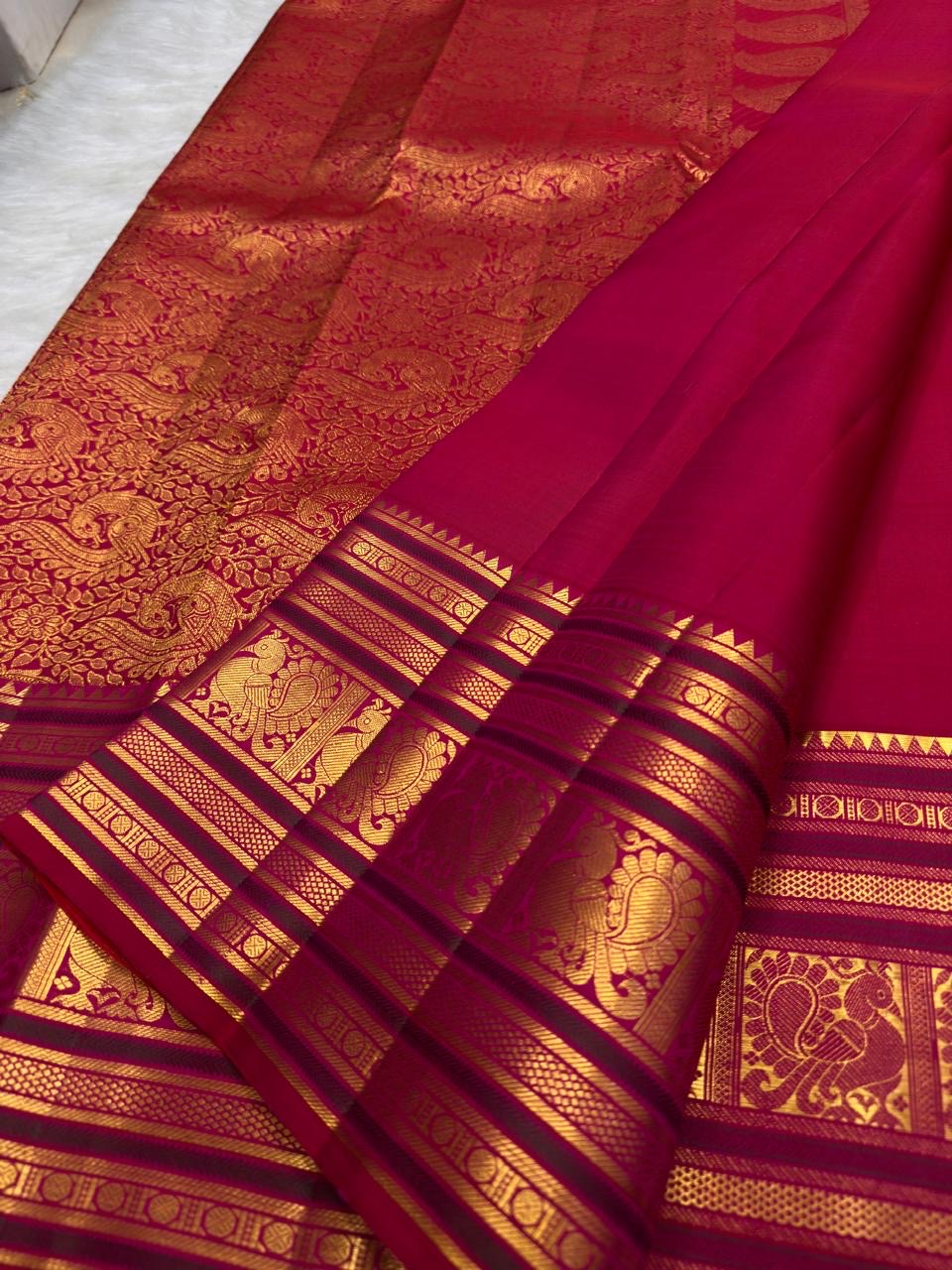 Deep Arakku pink Varisaipet pure silk Kanchipuram saree – fine gold oosivaanam stripes across the body