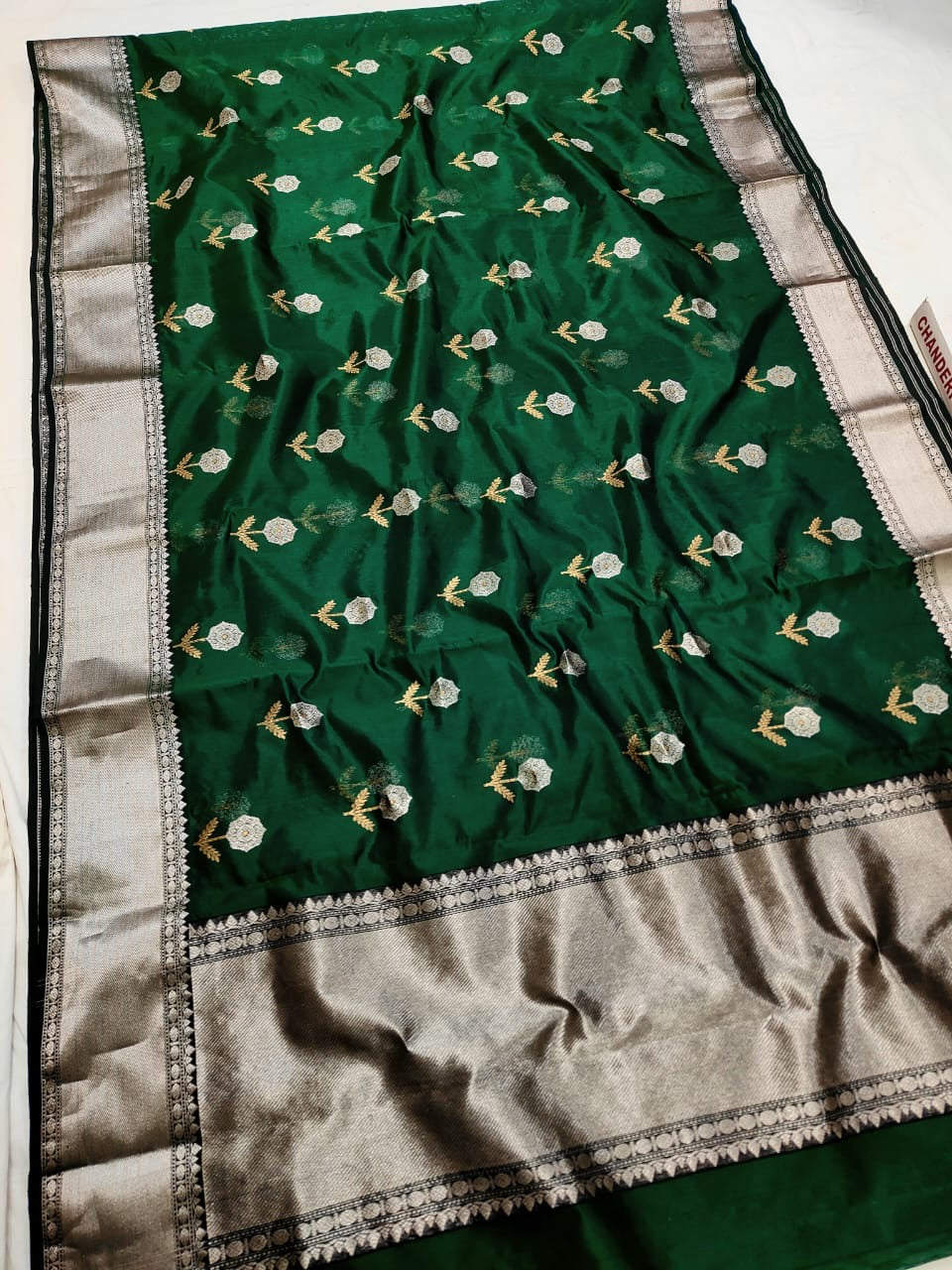 Emerald Green Silver Floral Pattu Silk Chanderi saree, draped view