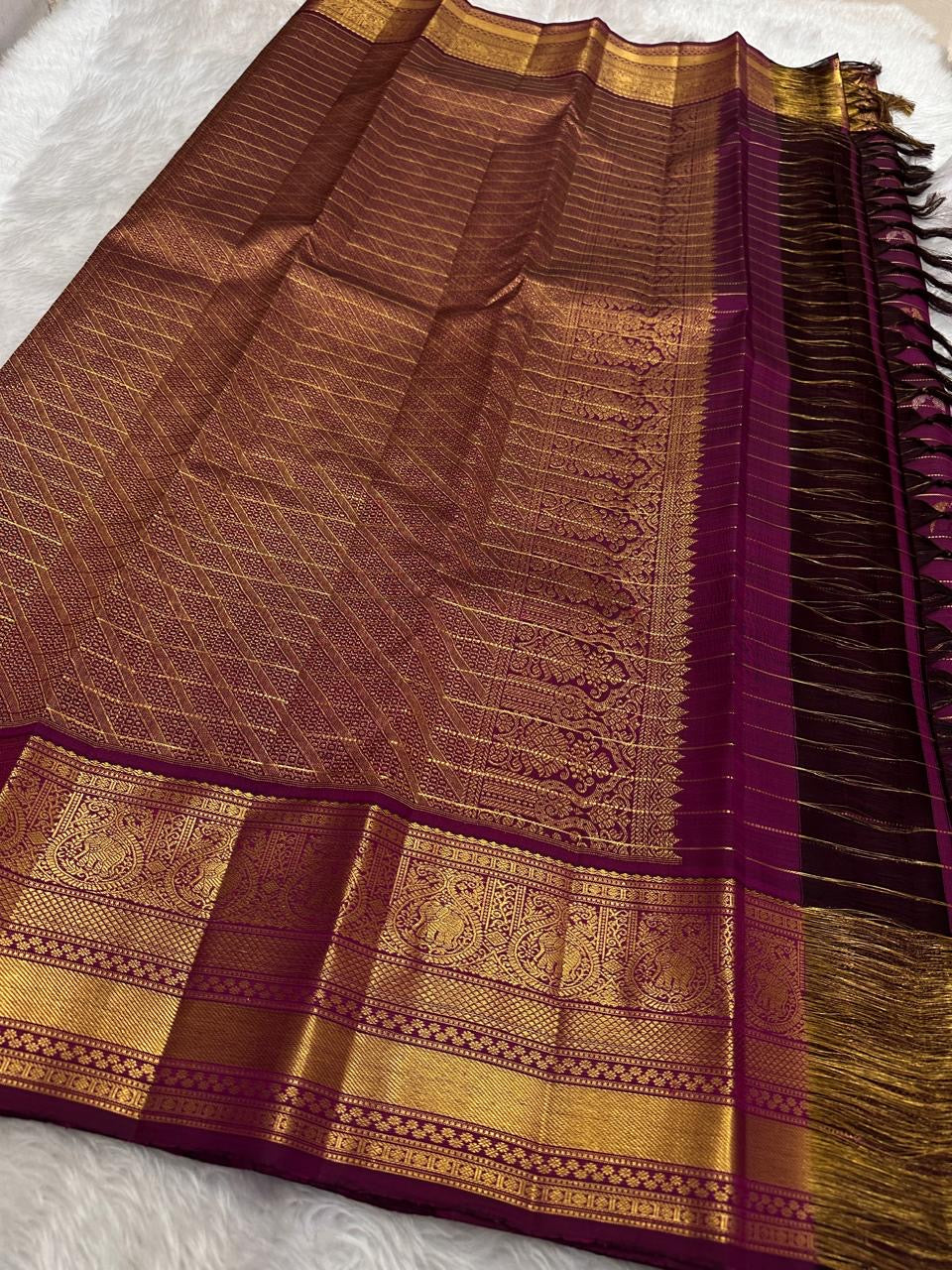 Naval Pazham purple Vairaoosi saree with antique gold zari floral and elephant border