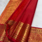Warm ivory handwoven pure silk Kanchipuram Kai Korvai saree with gold zari flying horse buttas and temple-red border