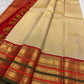 Grand Arakku red zari pallu with vertical ornamental panels and temple-inspired borders.