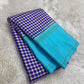 Turquoise Kanchi Kattam Kanchipuram silk saree with gold zari pallu, worn for a post-wedding temple visit.