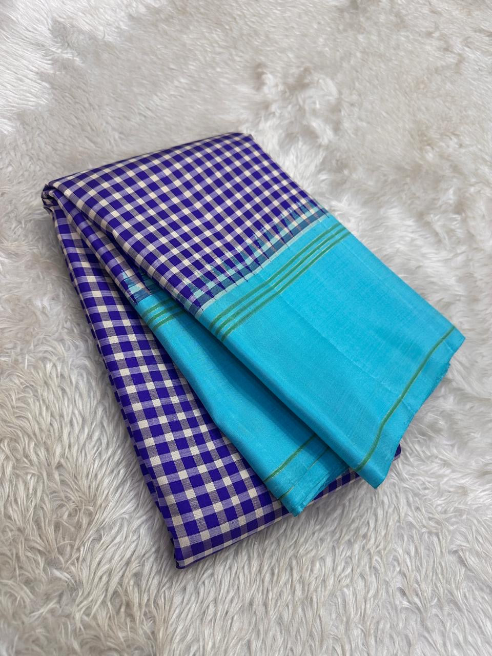 Turquoise Kanchi Kattam Kanchipuram silk saree with gold zari pallu, worn for a post-wedding temple visit.
