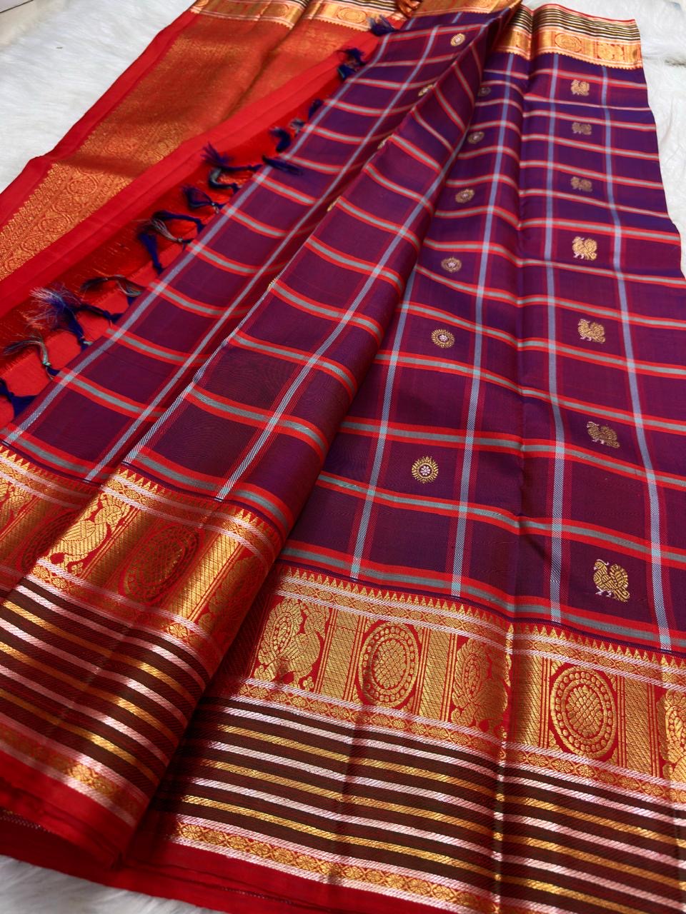 Arakku Red, Deep Violet & Muted Blue Pure Kanchipuram Silk Kanchi Kattam saree showing traditional handwoven body and richly detailed border.