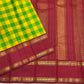 Grand pallu of the manjal yellow and ilai pachai Kanchipuram kattam saree finished with the red border