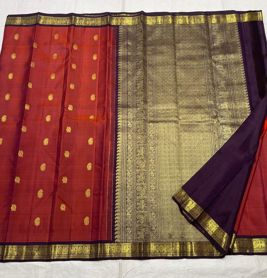 Rust and aubergine handwoven pure silk Kanchipuram Korvai saree — overview of the full saree drape