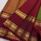 Olive green Kanjeevaram silk saree draped showing maroon rettapet border contrast — Idam Living