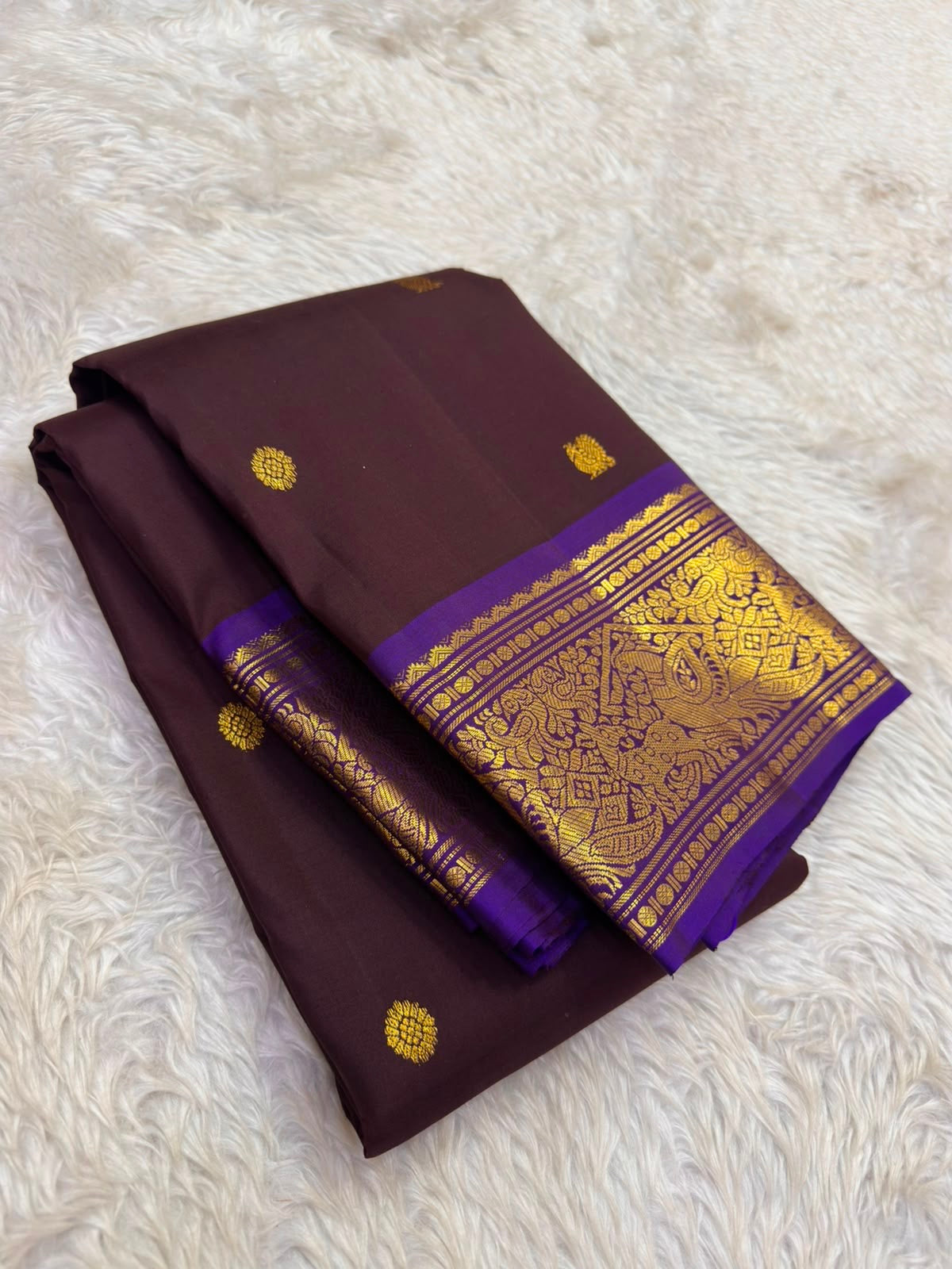 Handwoven Kanchipuram saree with royal violet border and antique gold deer motifs