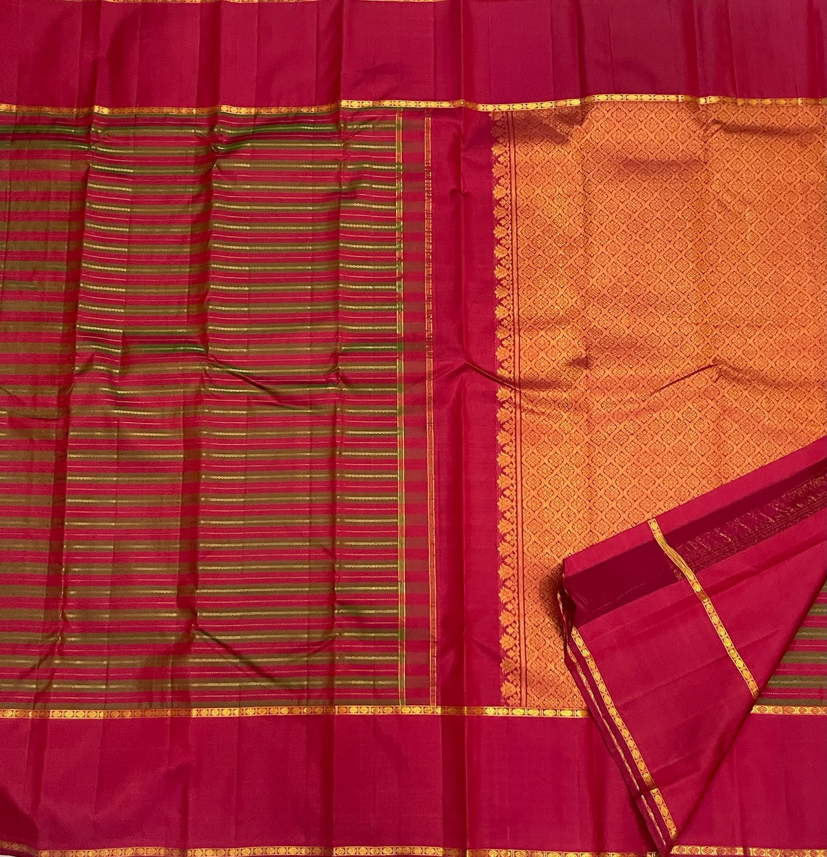 Broad vermilion-raspberry Rettapet border framed by antique-gold geometric bands on vintage Kanchipuram silk saree