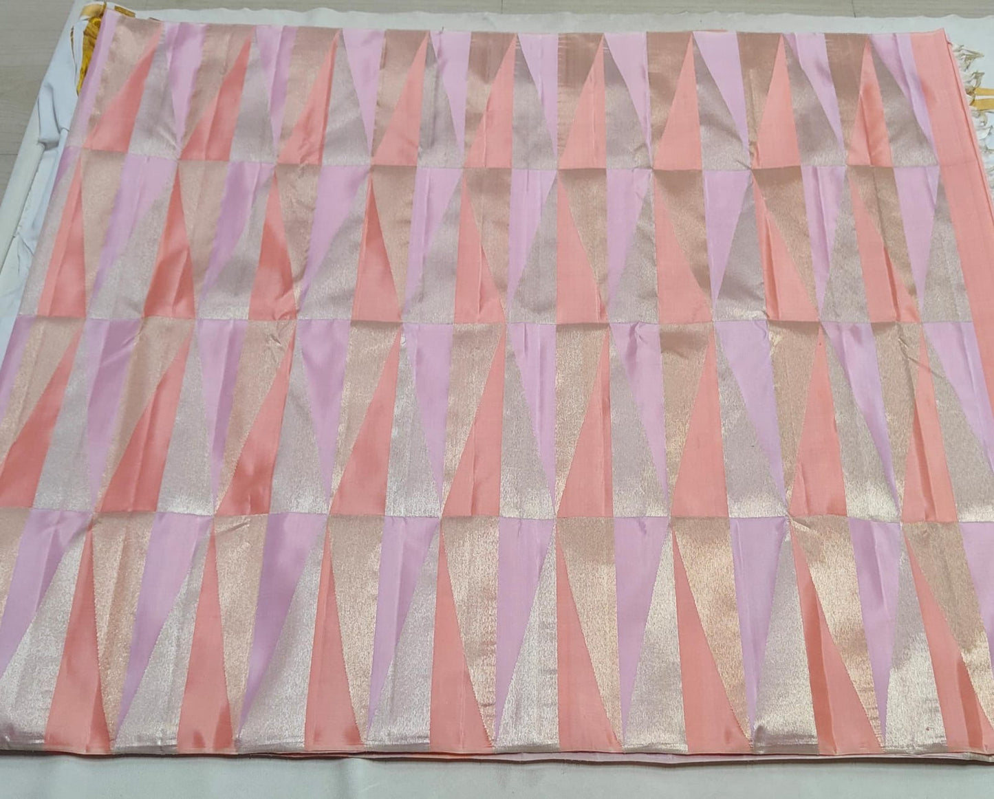 Pastel pink and lilac handwoven pure silk Kanchipuram Ettukol saree — close view of the body weave and texture