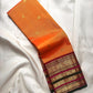 Marigold orange Varisaipet Kanchipuram saree with Arakku red border detail.