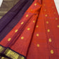 Rust and aubergine handwoven pure silk Kanchipuram Korvai saree — close view of the body weave and texture