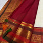 Ivory pure silk Kanchipuram saree, silk texture close up with warm ivory with arakku-red, vermilion and manthulir-green accents