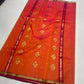 Sunset Orange and Pink Katan Silk Chanderi handloom saree — fabric texture