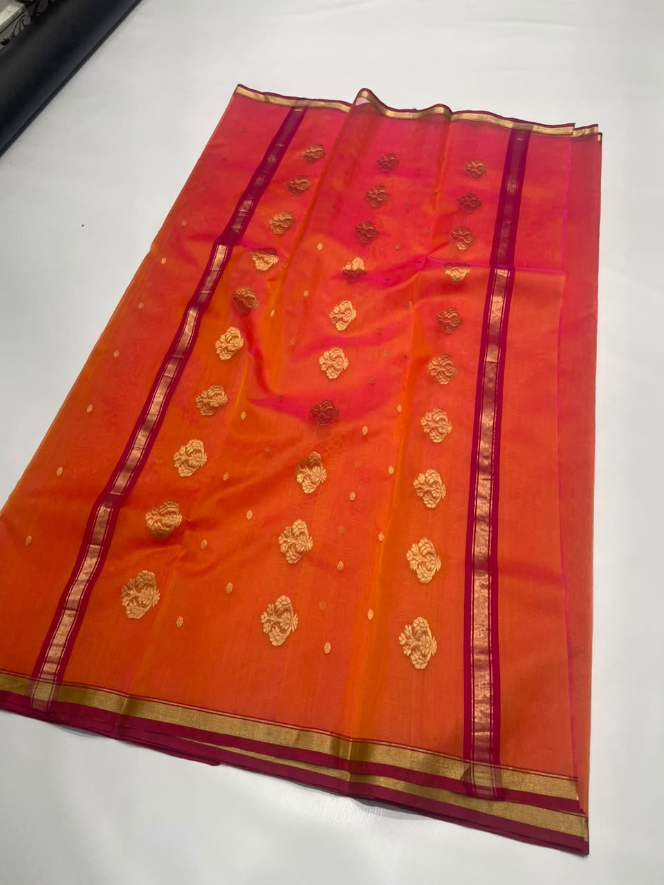 Sunset Orange and Pink Katan Silk Chanderi handloom saree — fabric texture