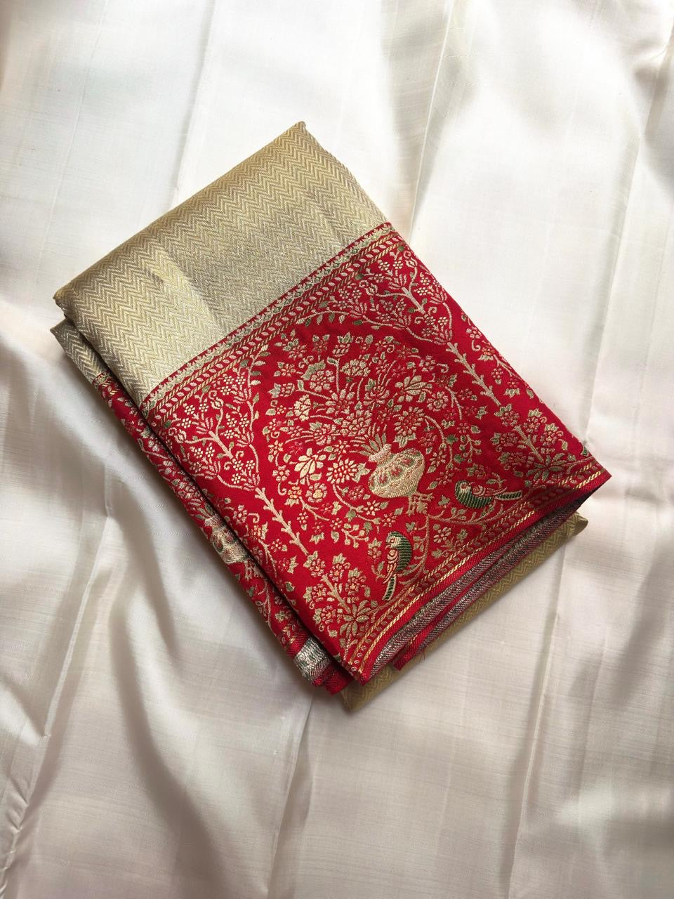 Sandalwood ivory handwoven pure silk Banarasi-Kanchipuram fusion saree with champagne-gold zari and vermilion-red floral urn and bird border