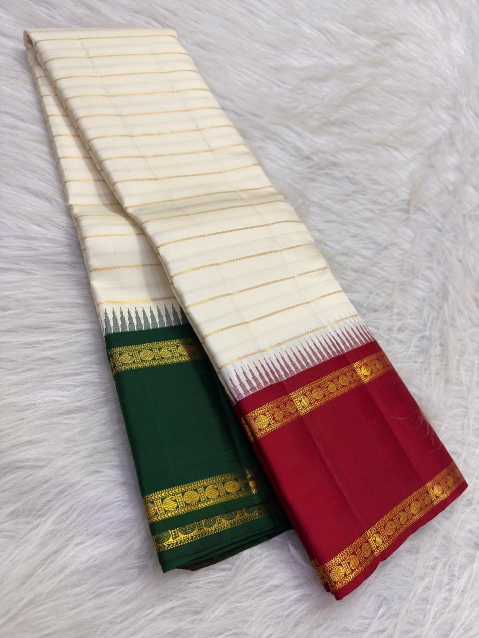 Ivory Gold Veldhari Korvai Kanjivaram silk saree with arakku red and green Ganga Jamuna border, worn for a temple procession.
