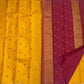 Close view of the handwoven floral silk-thread buttas on pure silk Kanchipuram saree