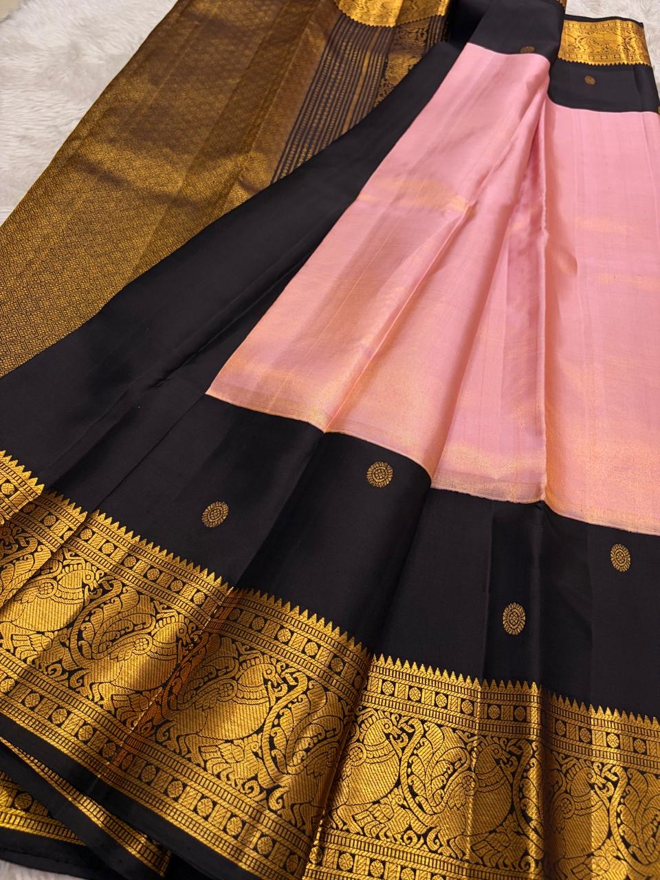 Pure Kanchipuram silk saree in kanchana purple with brown border pallu and soft gold zari motifs