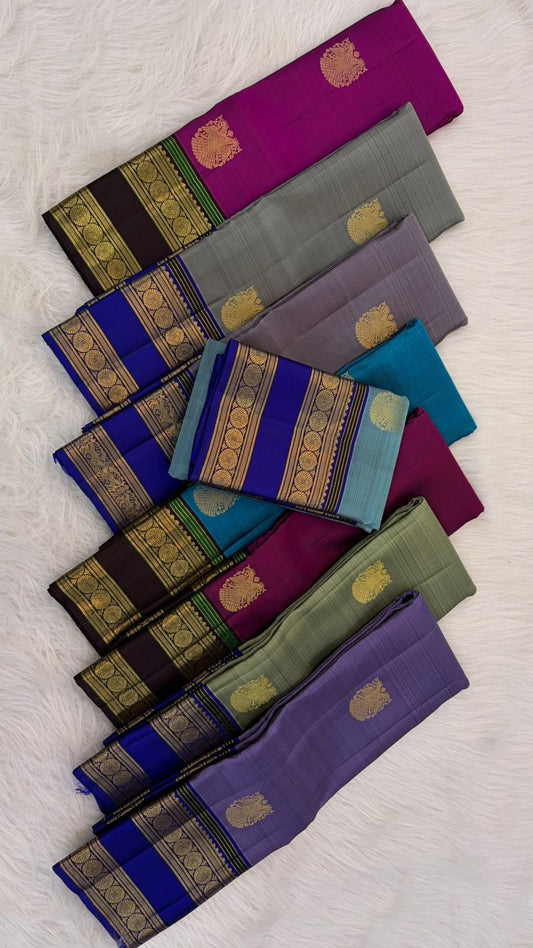 Magenta and aubergine handwoven pure silk Kanchipuram Rettapet saree — close view of the body weave and texture