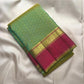 Thulir Pachai and Raspberry Pink Handwoven Pure Silk Kanchipuram Pattupet Saree, peacock array in decorative border