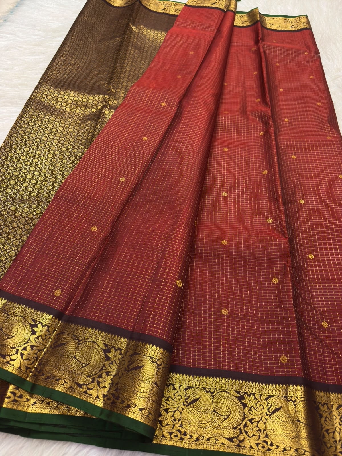 Vermilion red handwoven pure silk Kanchipuram Zari Kattam saree with fine gold zari grid and spaced gold buttas, full view