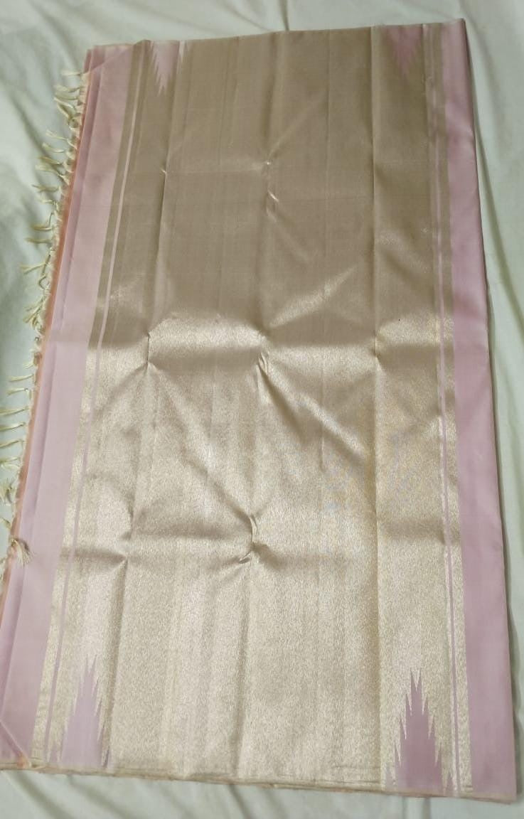 Pastel pink and lilac handwoven pure silk Kanchipuram Ettukol saree — close-up of the gold zari detailing