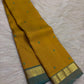 Turmeric Yellow and Peacock Blue Simple Kanchipuram silk saree, detail view
