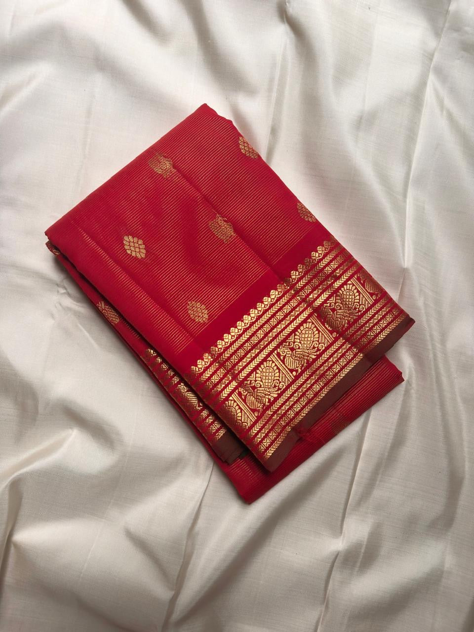 Arakku Red Kanchipuram Vairaoosi silk saree pallu with ornate gold zari panels and traditional woven details