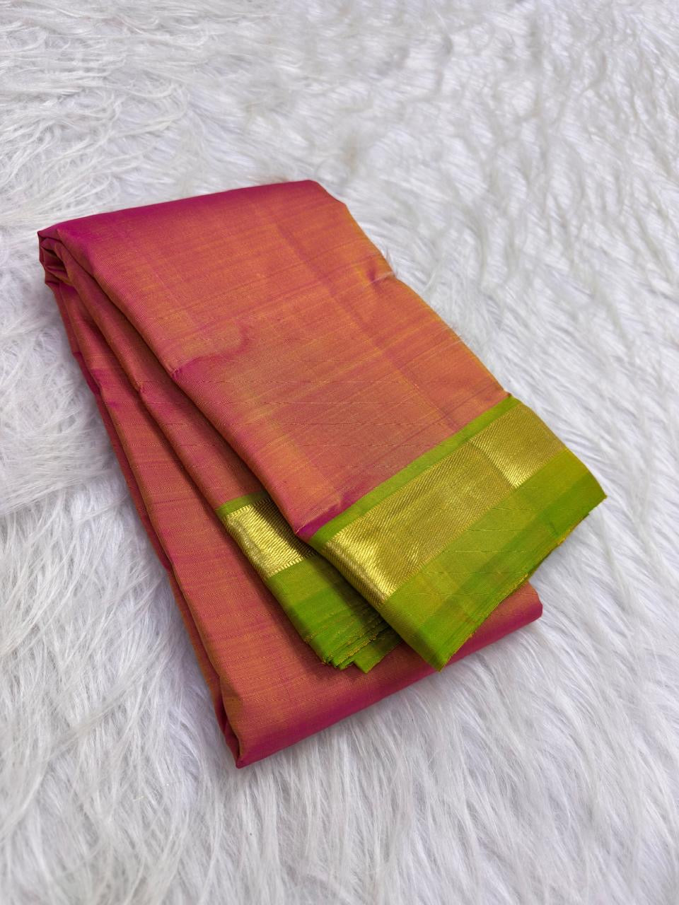 Thulir Pachai green Pure Kanchipuram Silk saree with Vadamalli pink body, slim gold-toned zari border and pallu