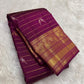 Handwoven Kanchipuram saree in Naval Pazham purple with alternating silver and gold twin bird motifs