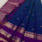 Peacock blue and magenta handwoven pure silk Kanchipuram Rettapet saree — detail of the saree border