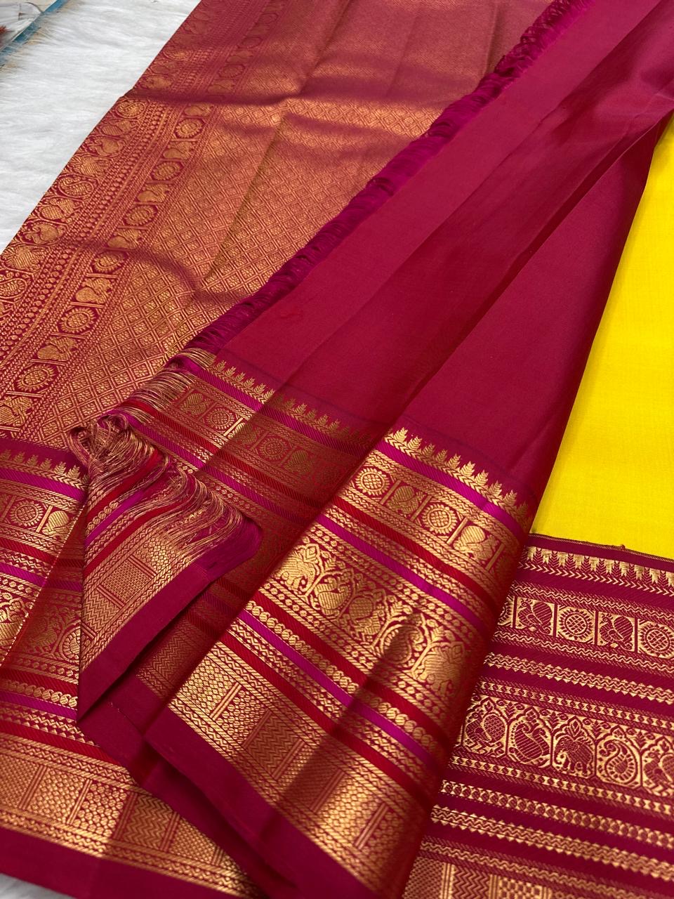 Turmeric Yellow & Arakku Red handwoven Kanchipuram silk saree by Idam Living