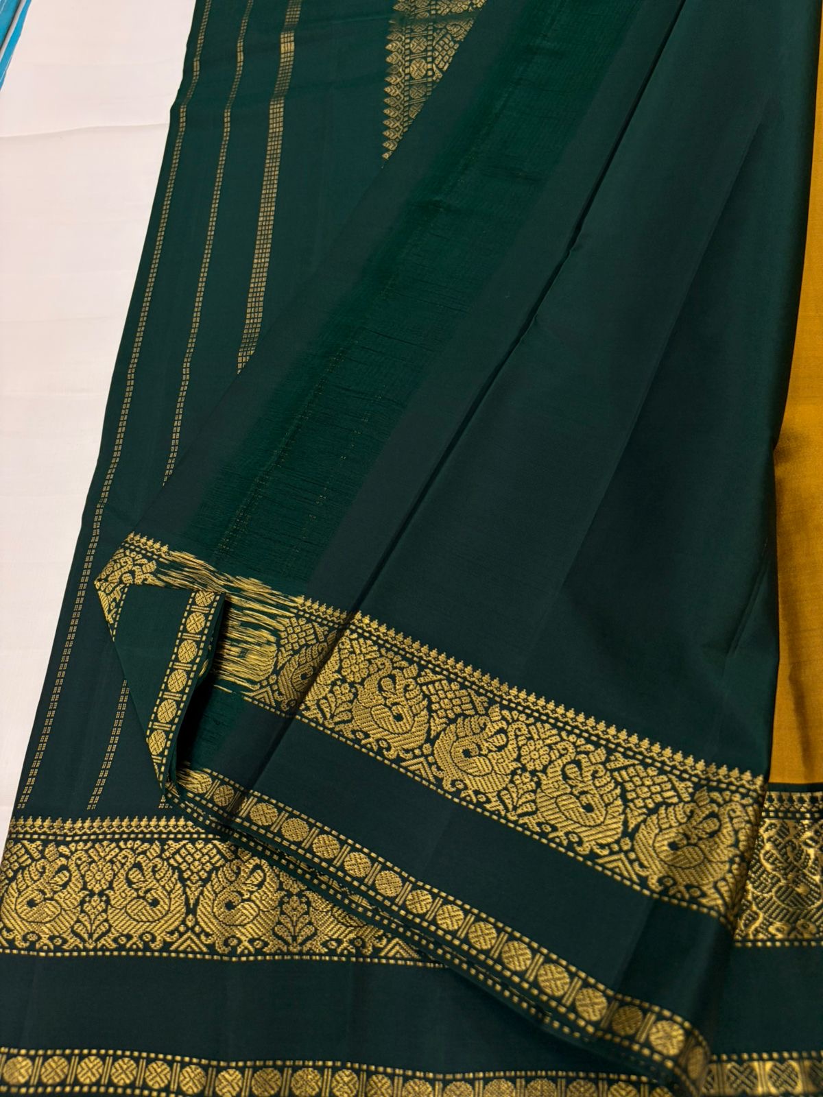 Antique Gold and Forest Green Handwoven Pure Silk Kanjivaram Saree with Mayil Butta Border