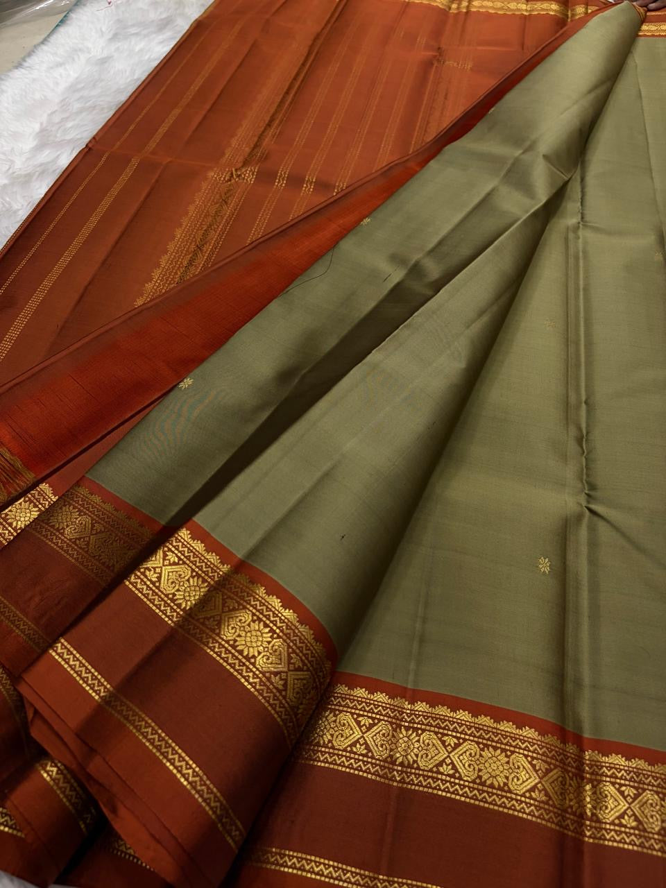 Moss Green and Rust Handwoven Pure Silk Kanjivaram Saree with Korvai Border