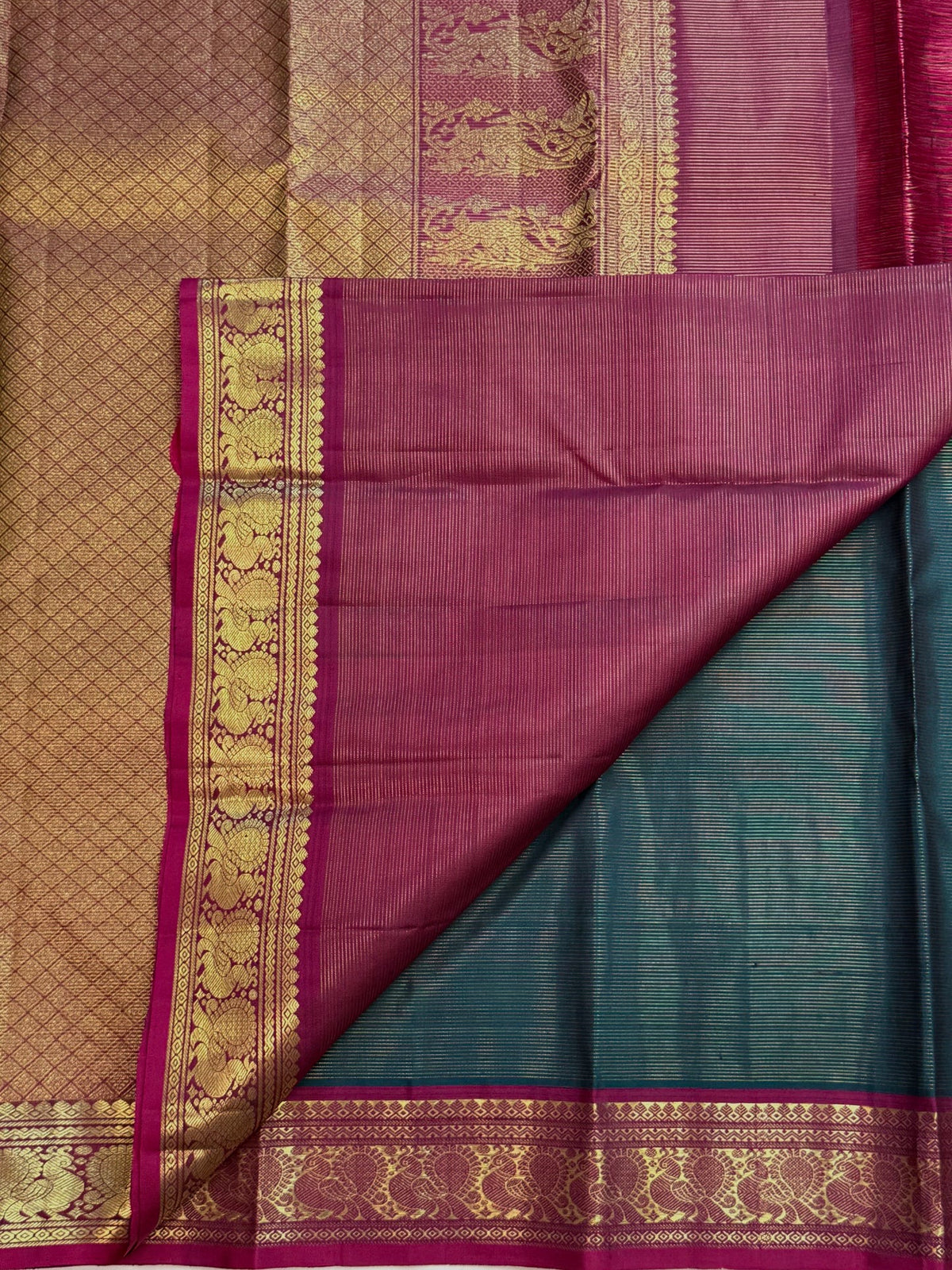 Rani pink accented border on a steel-blue Vairaoosi Kanchipuram saree, Idam Living (photo 3 of 5)