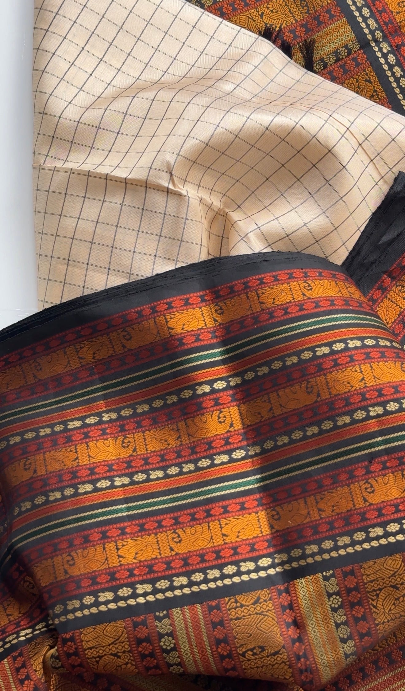 Kanchi silk saree with ivory black contrast in kattam checks and delicate silk thread woven motifs on pure silk base