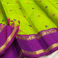 Kanchipuram silk saree vivid green with peacock motifs and violet zari border pallu detail