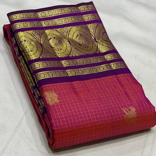 Pink Kanjivaram silk saree draped view showing purple border and gold zari kattam grid