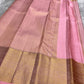Kancheepuram silk saree pink body apricot border pallu detail traditional zari