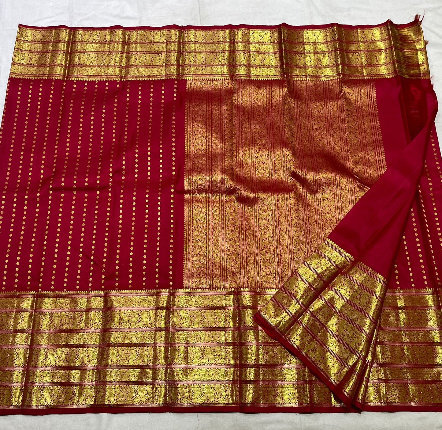 Kancheepuram silk saree border detail with varisaipet pattern and traditional gold zari
