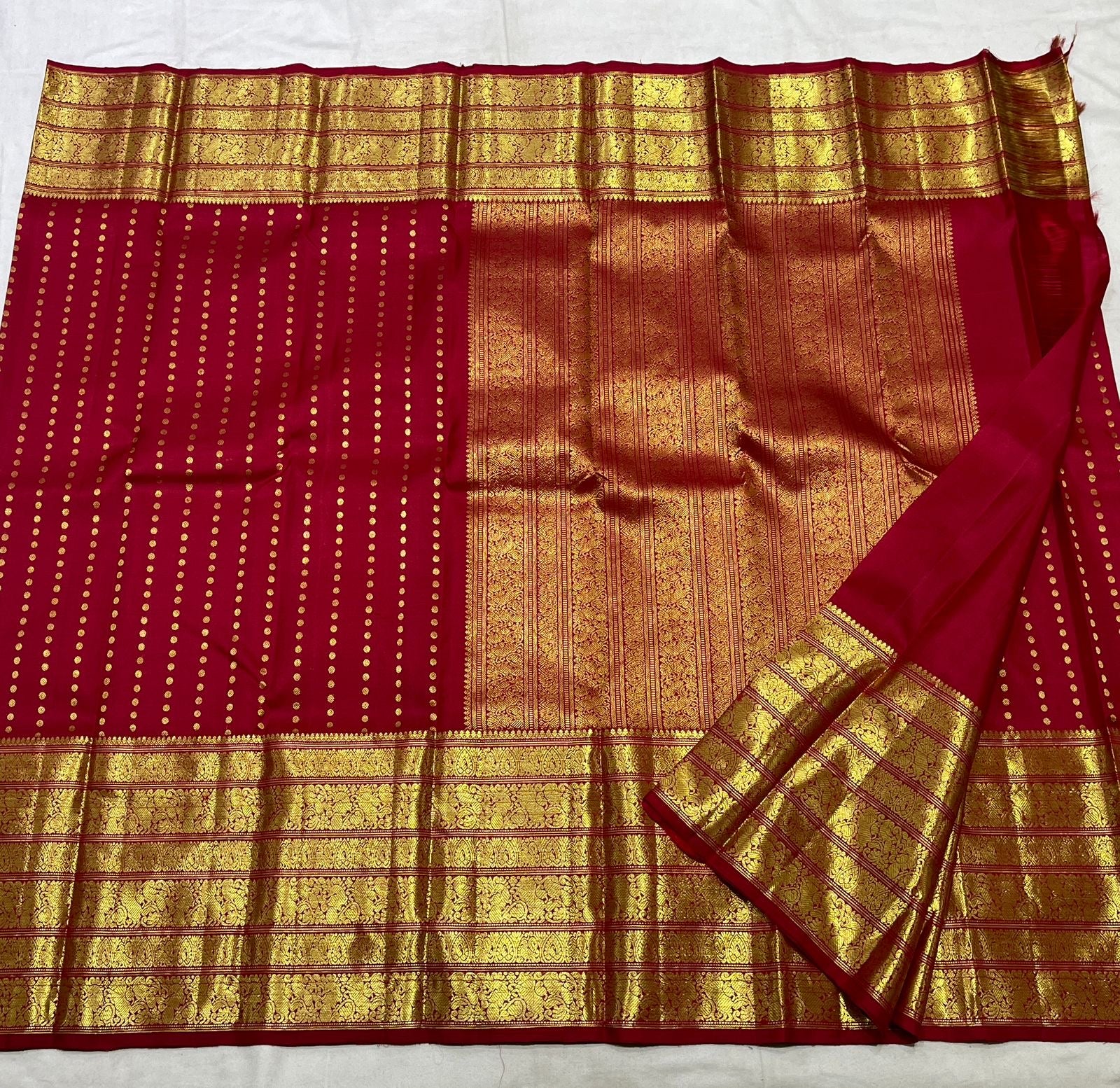 Kancheepuram silk saree border detail with varisaipet pattern and traditional gold zari