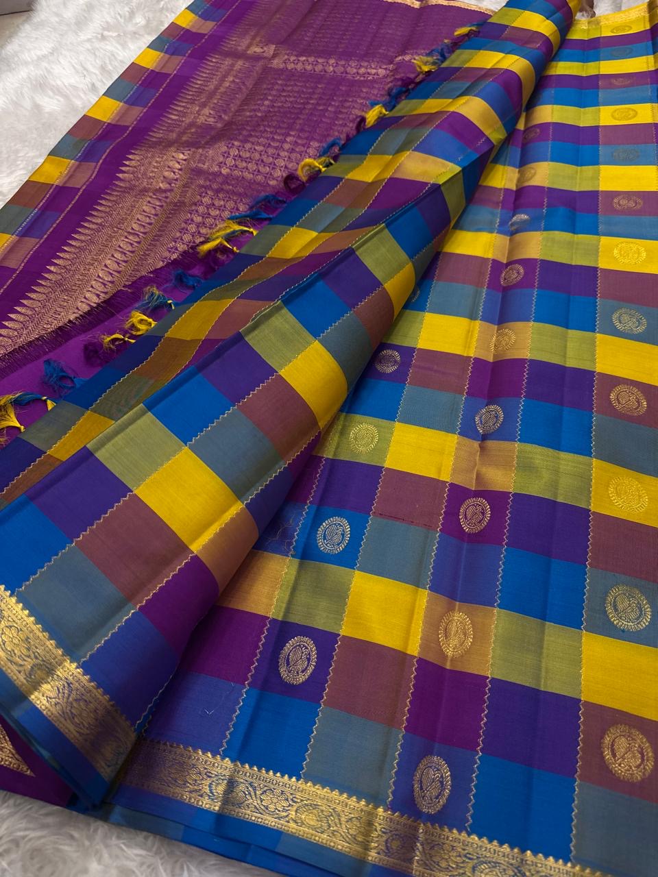 Kancheepuram silk saree multicolor checked body with gold zari motifs close detail