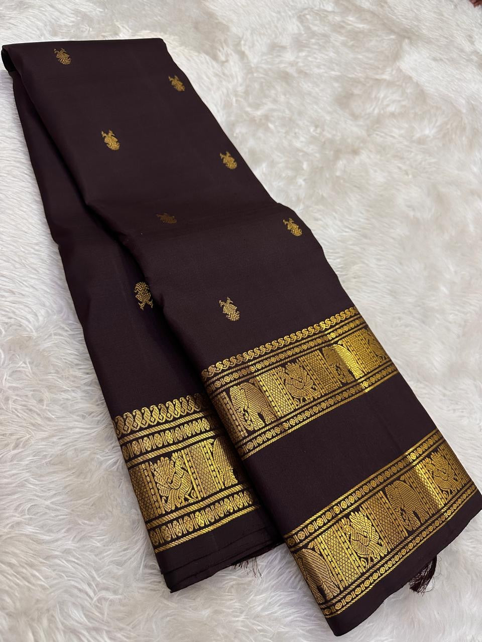 Deep plum and aubergine pure silk saree with antique gold zari details