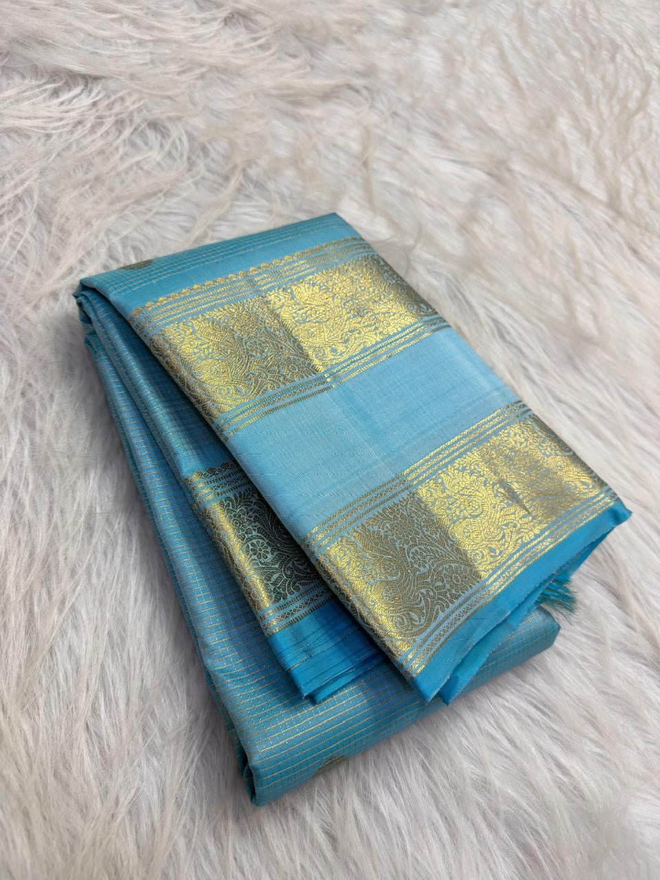 Sky blue and aqua vintage Kanchipuram Rettapet saree, grand pallu with ornate zari lattice, handwoven gold zari and traditional detailing